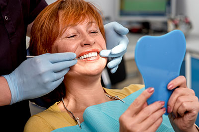 JASI Smile | Root Canals, Dental Bridges and Veneers